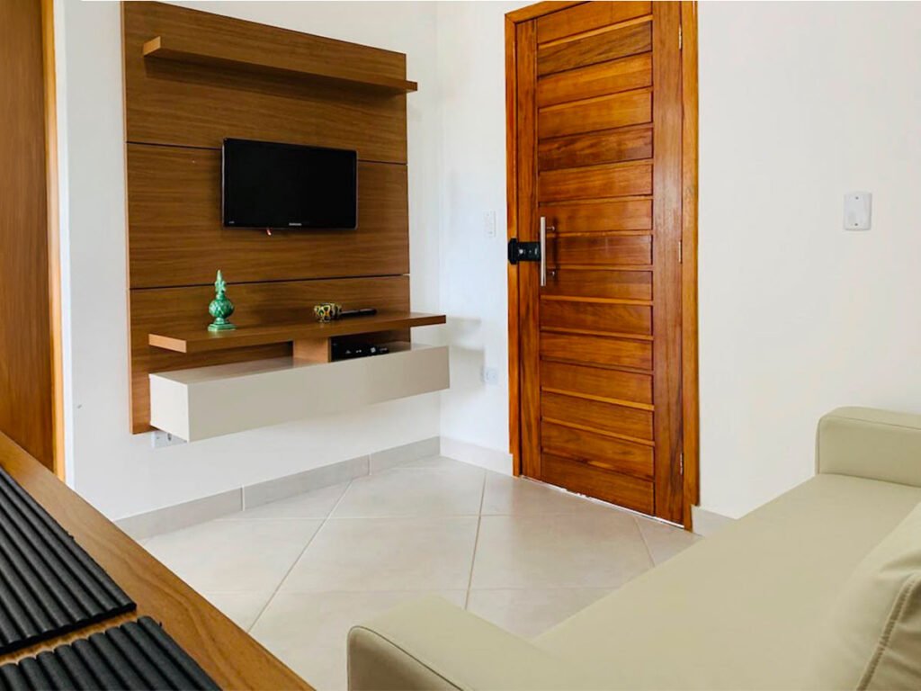 Sala do apartamento 302 de 1 dormitório para temporada na Maranduba em Ubatuba